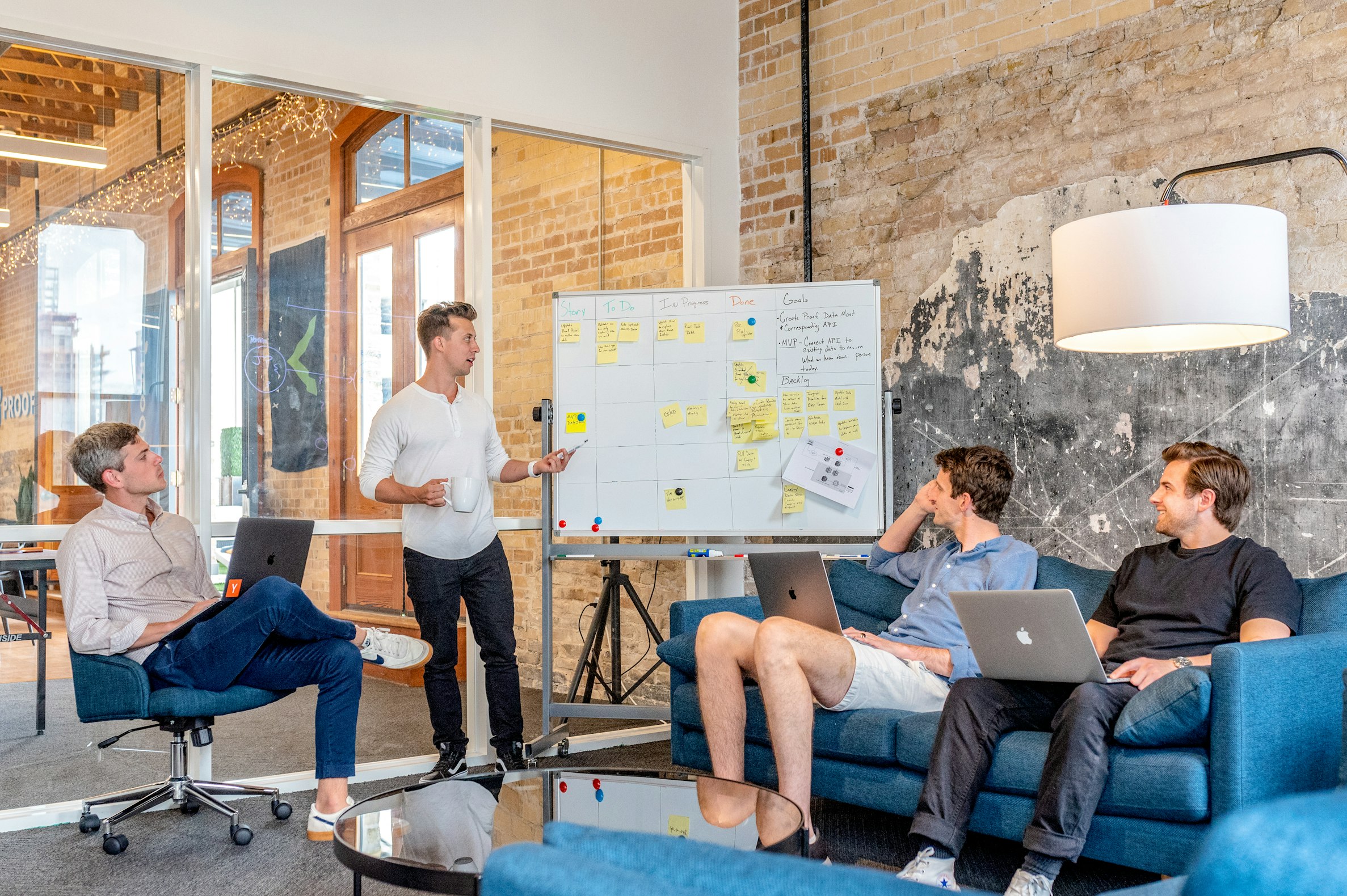 Business consultant presenting strategic insights to client team