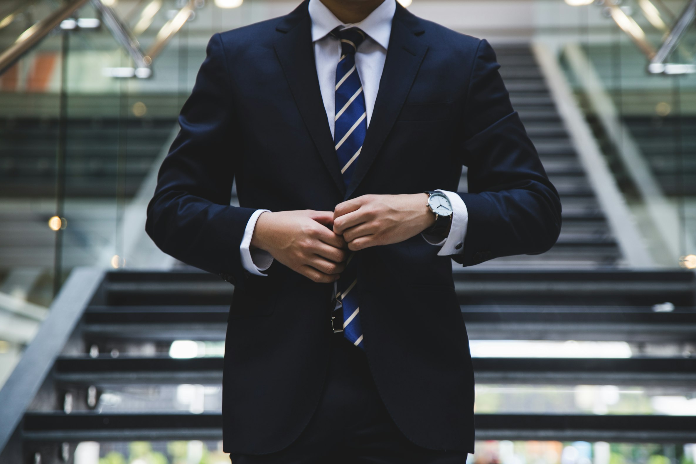 Professional handshake representing trust and partnership in insurance services